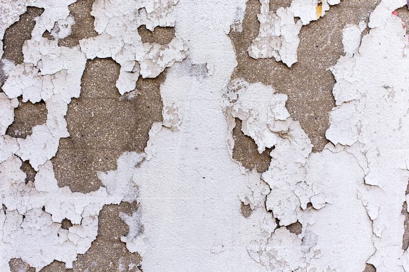 Chipped paint on a brick