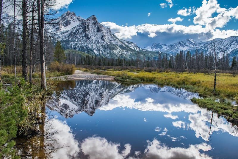 Reflection of McGown Peak in a wetlands area very near Stanley Lake in Idaho season