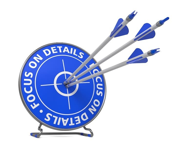 Focus on Details Concept. Three Arrows Hit in Blue Target.