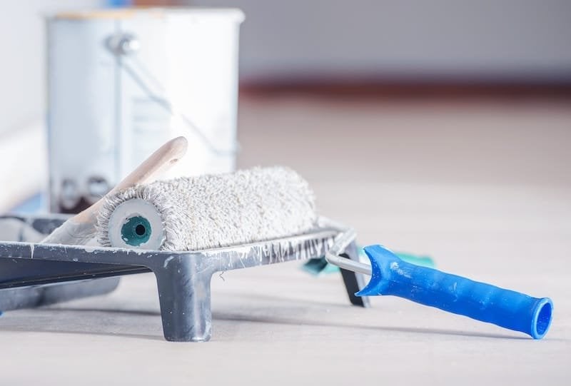 Painting Accessories. Paint Roller Painting Equipment. White Paint. Interiors Renovation.