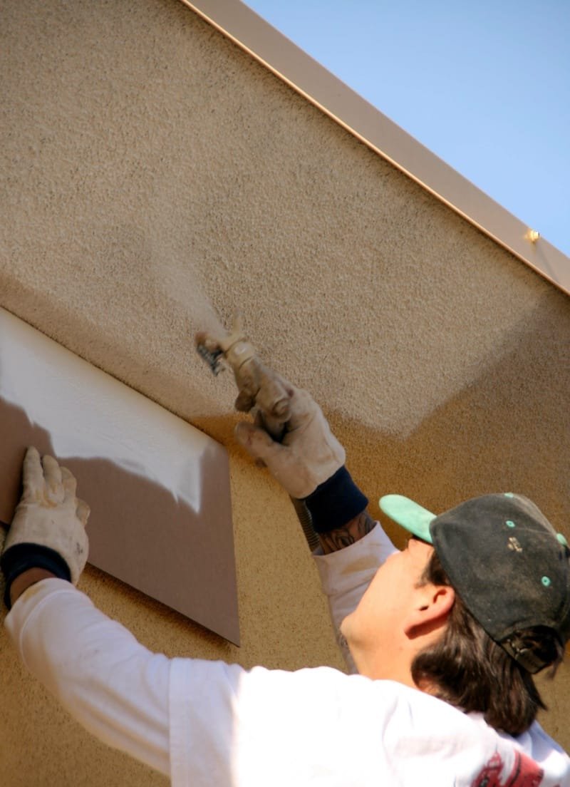 applying texcote to building exterior