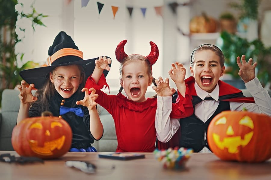 kids with halloween costumes