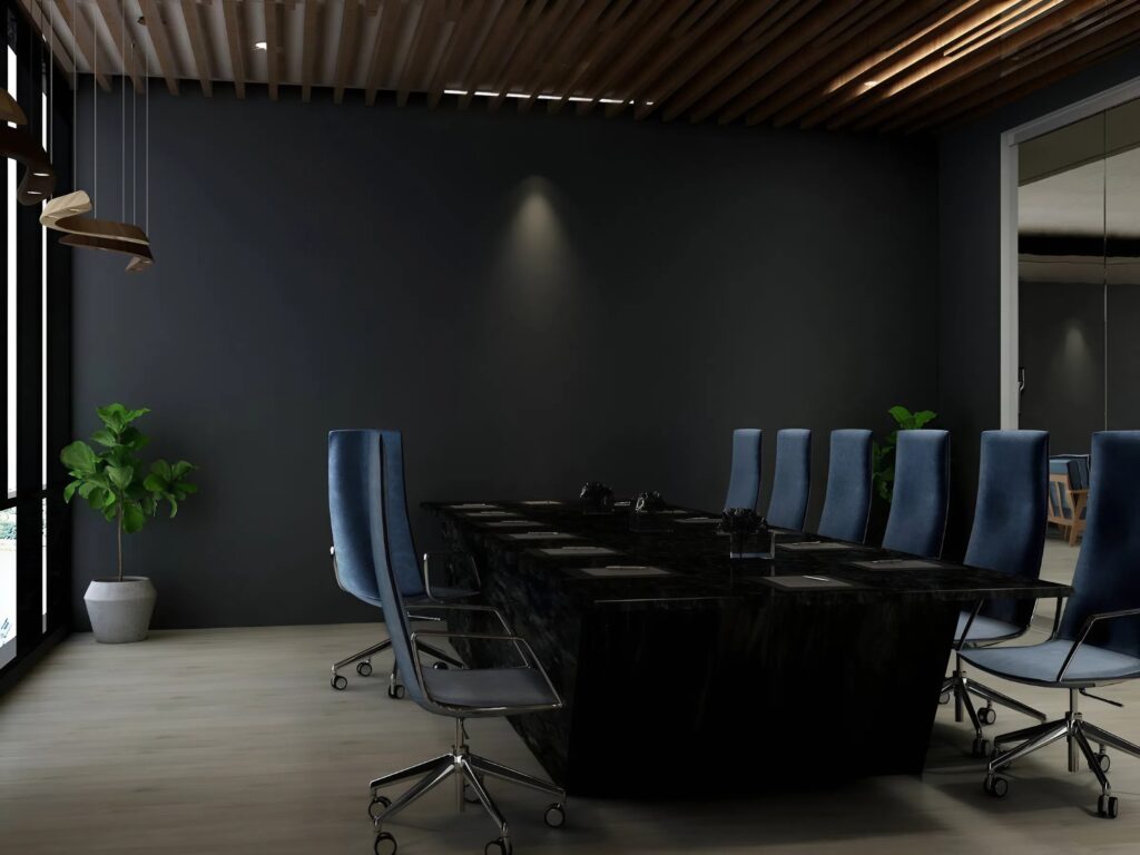 Freshly painted dark accent wall in a modern office conference room by an interior painter in Boise, ID