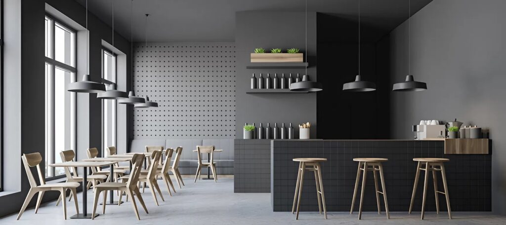 Modern café interior with matte charcoal and warm gray walls by a commercial painter in Caldwell, ID.