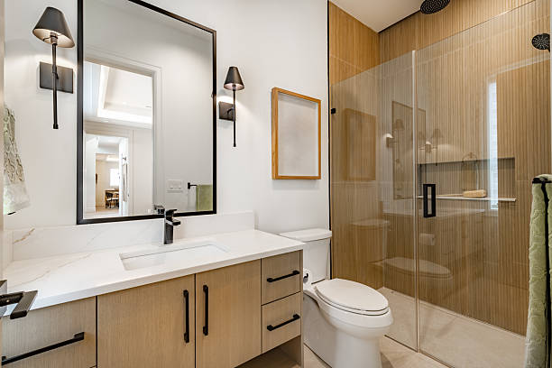 Modern bathroom featuring warm neutral walls and wood accents by a house painter in Nampa, ID