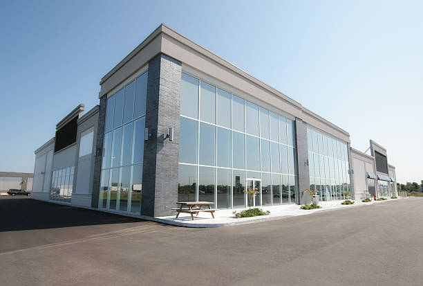 Commercial building in white with ore accents and a durable exterior coating applied by a commercial painter in Meridian, ID